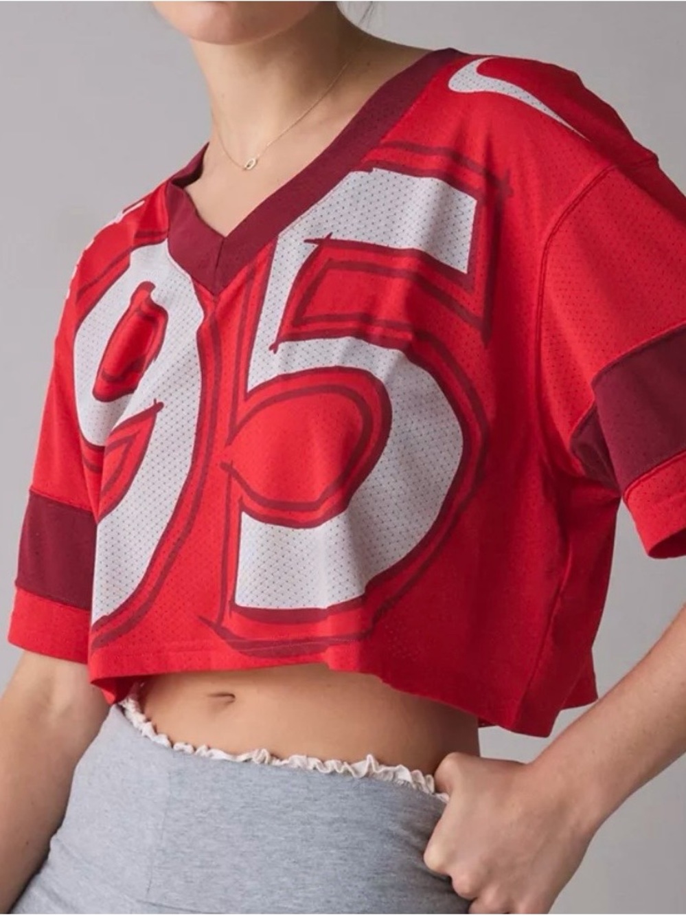 Nike Red Cropped Sport Jersey with Bold '95' Graphic Sz small